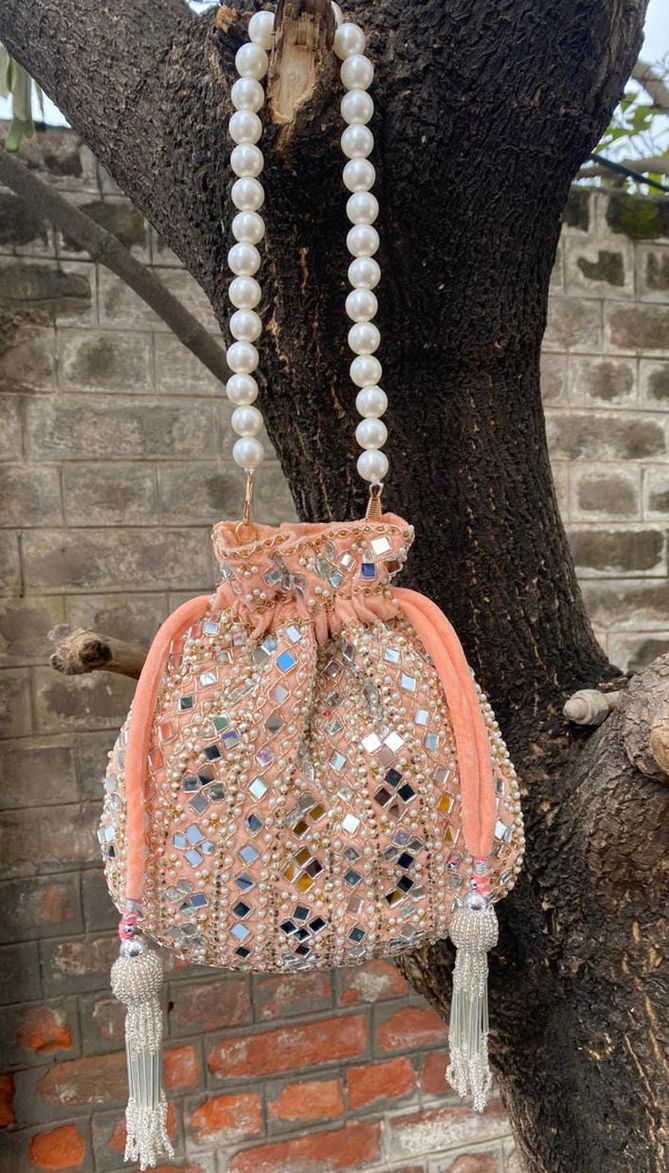 Wedding Wear Pearl Handle And Mirror Work Potli Bag Wholesale  Suppliers In India
